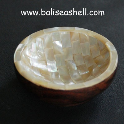 bowl made from mother of pearl with wood