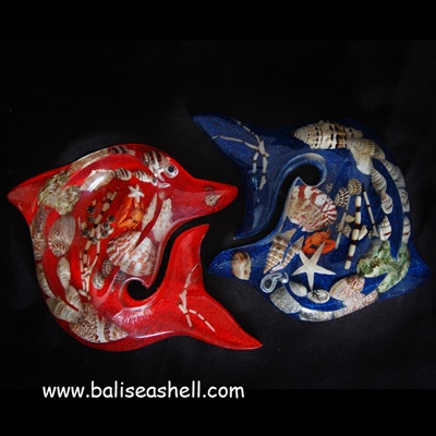 shell disc art with fish ornament