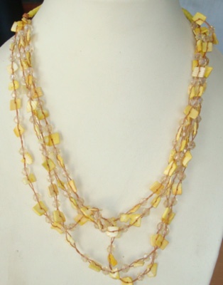 necklace shell with colour string
