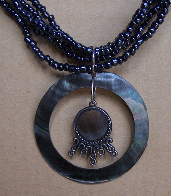 Black mop necklace with metal