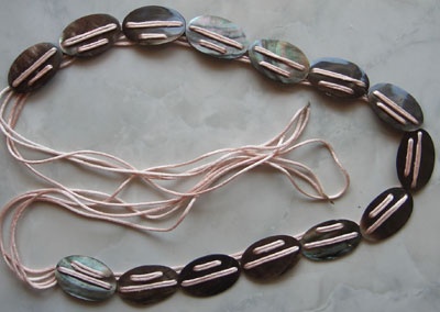 Belt shell around oval