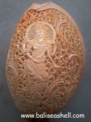 seashell carving art from melo