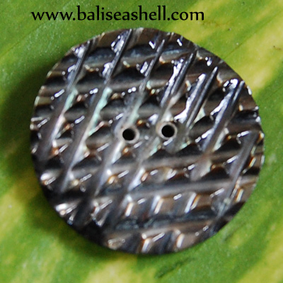 carving button art indonesia
