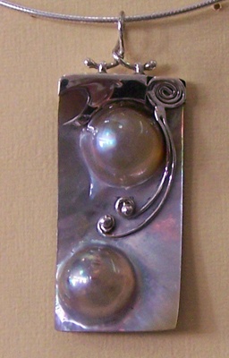 Two Halfer Pearl Shell Pendants